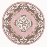 Round pink rug with floral patterns on a white background