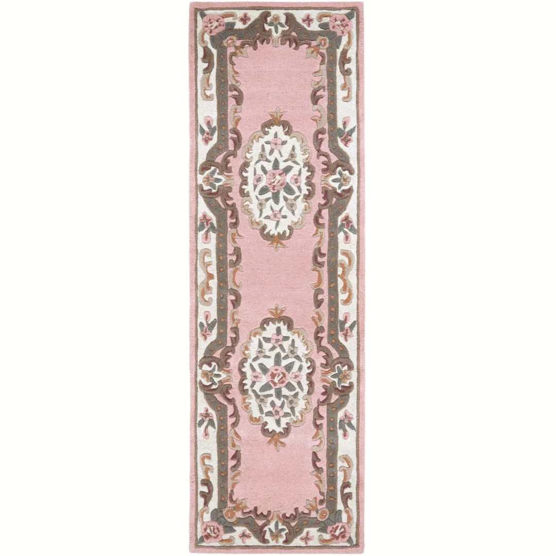 Decorative rug with floral patterns on a pink background
