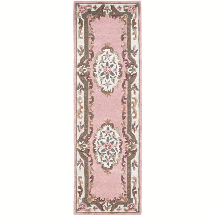 Decorative rug with floral patterns on a pink background