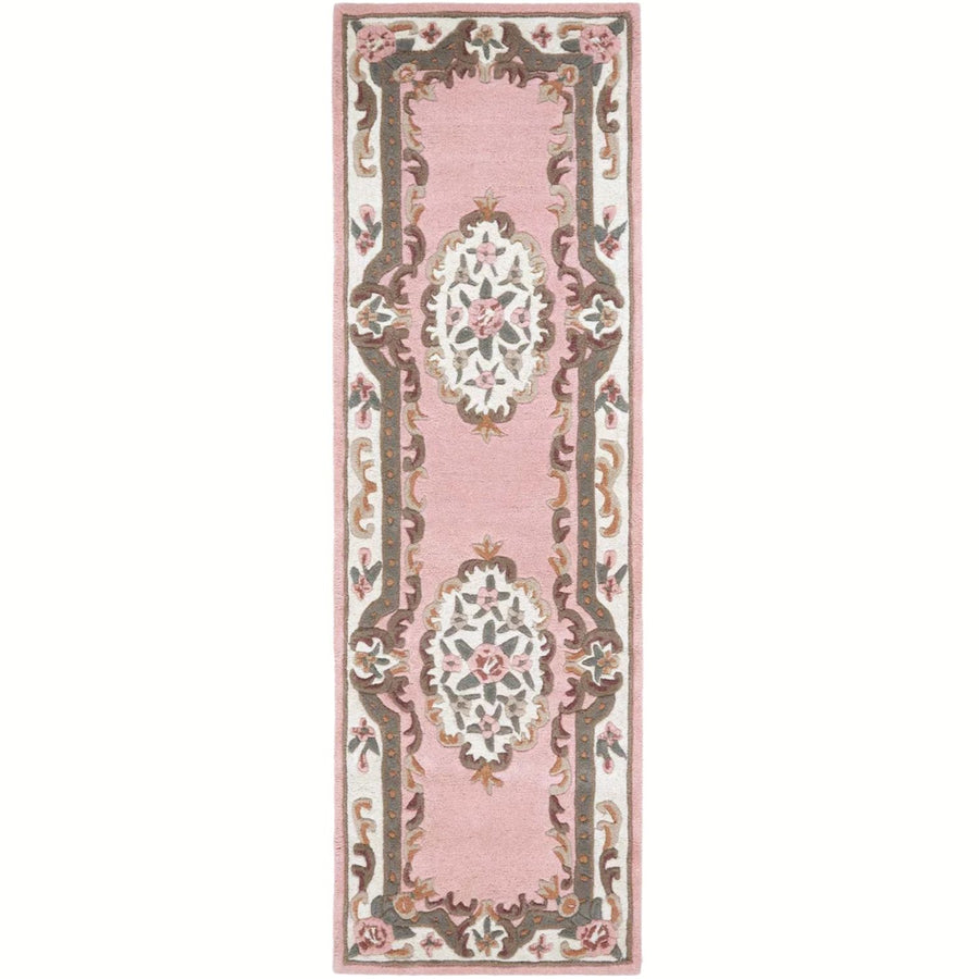 Decorative rug with floral patterns on a pink background