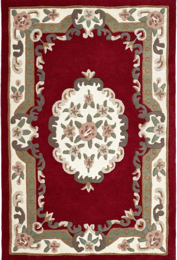 Decorative rug with floral patterns on a red background