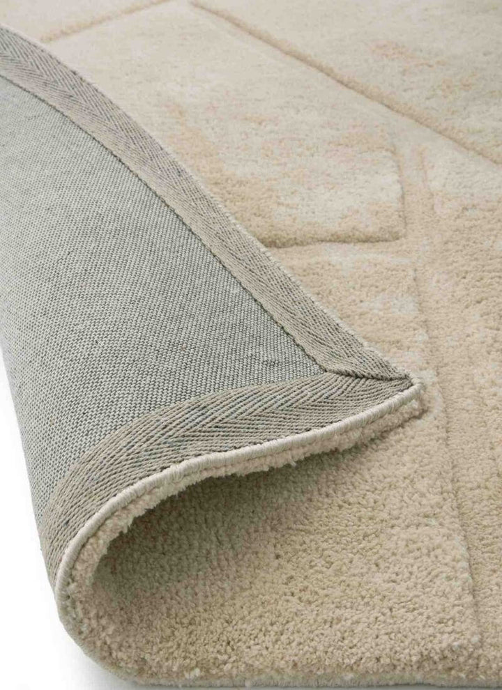 Close-up of a Scandinavian deep pile rug in cream and grey, showing soft texture and durable cotton backing.