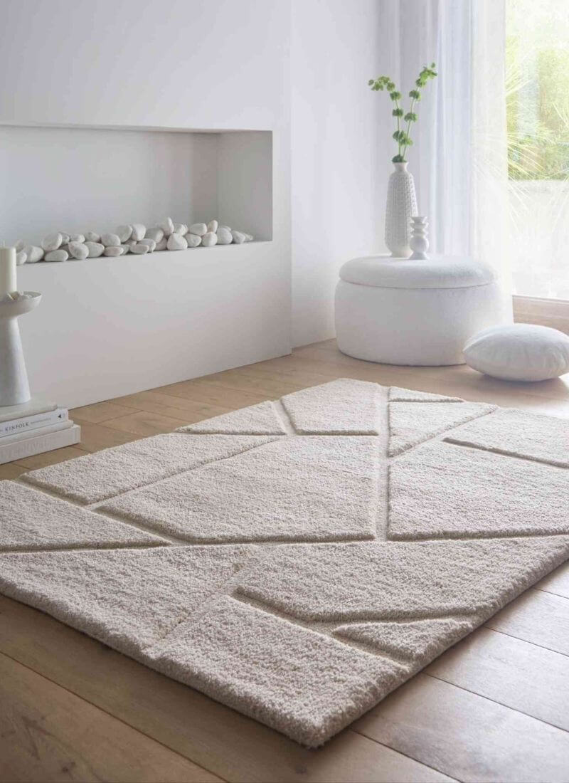 Scandinavian deep pile cream and grey rug in a modern living space, enhancing warmth and comfort with minimalist design.