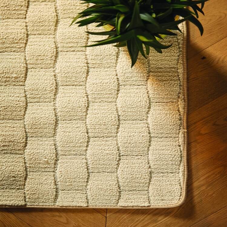 textured cream geometric mat with the environment