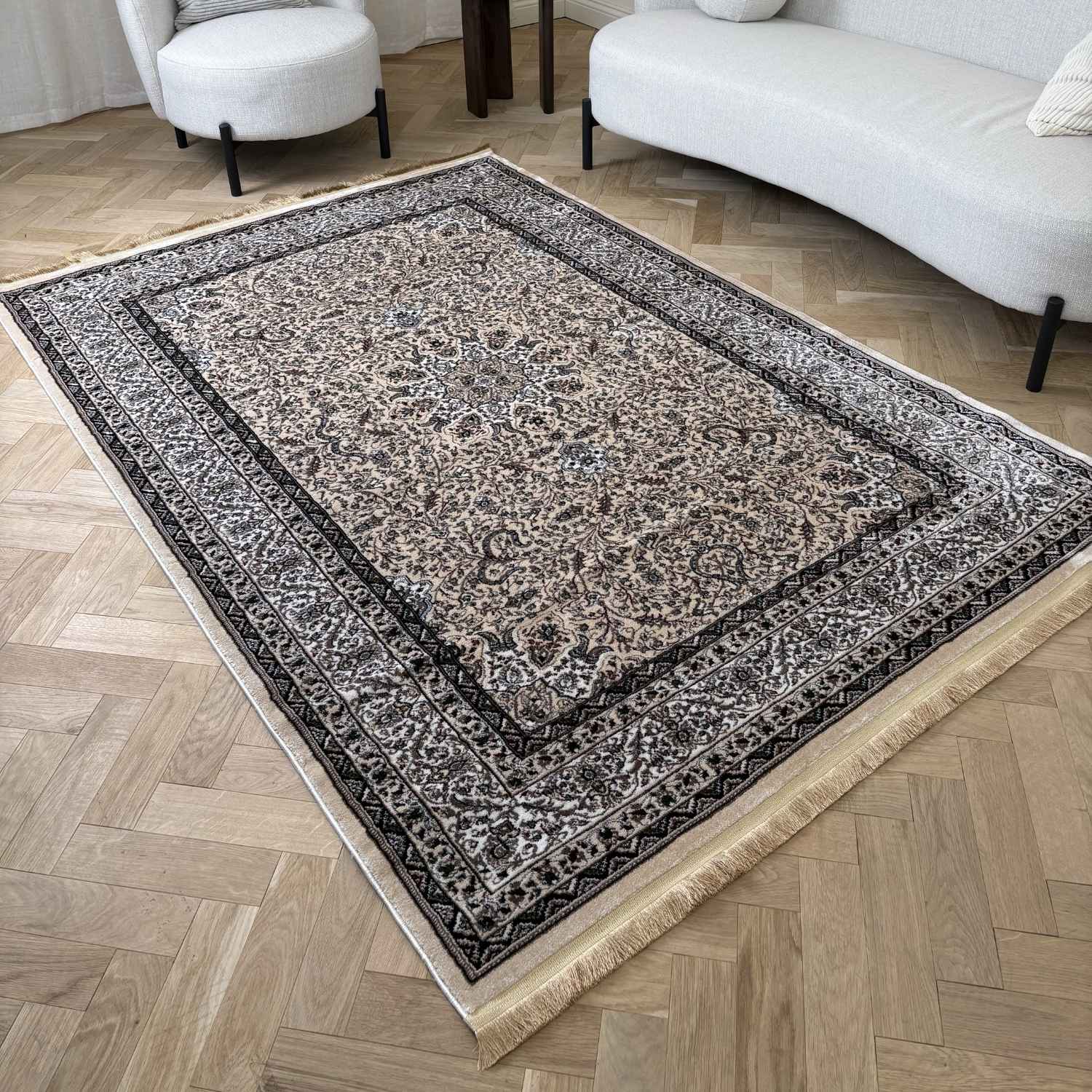 Decorative rug with intricate patterns on a wooden floor