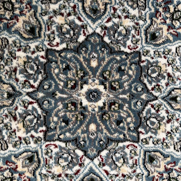Close-up of a patterned rug with intricate design