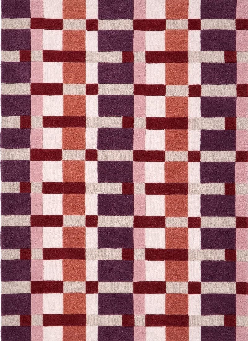 Hand-carved multicoloured geometric wool rug with block design, ideal for modern home interiors.