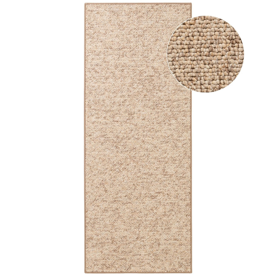Beige textured rug with a close-up detail on a white background