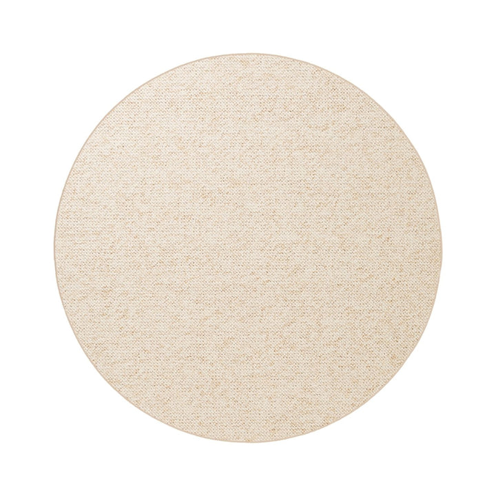 Round beige rug on a white background