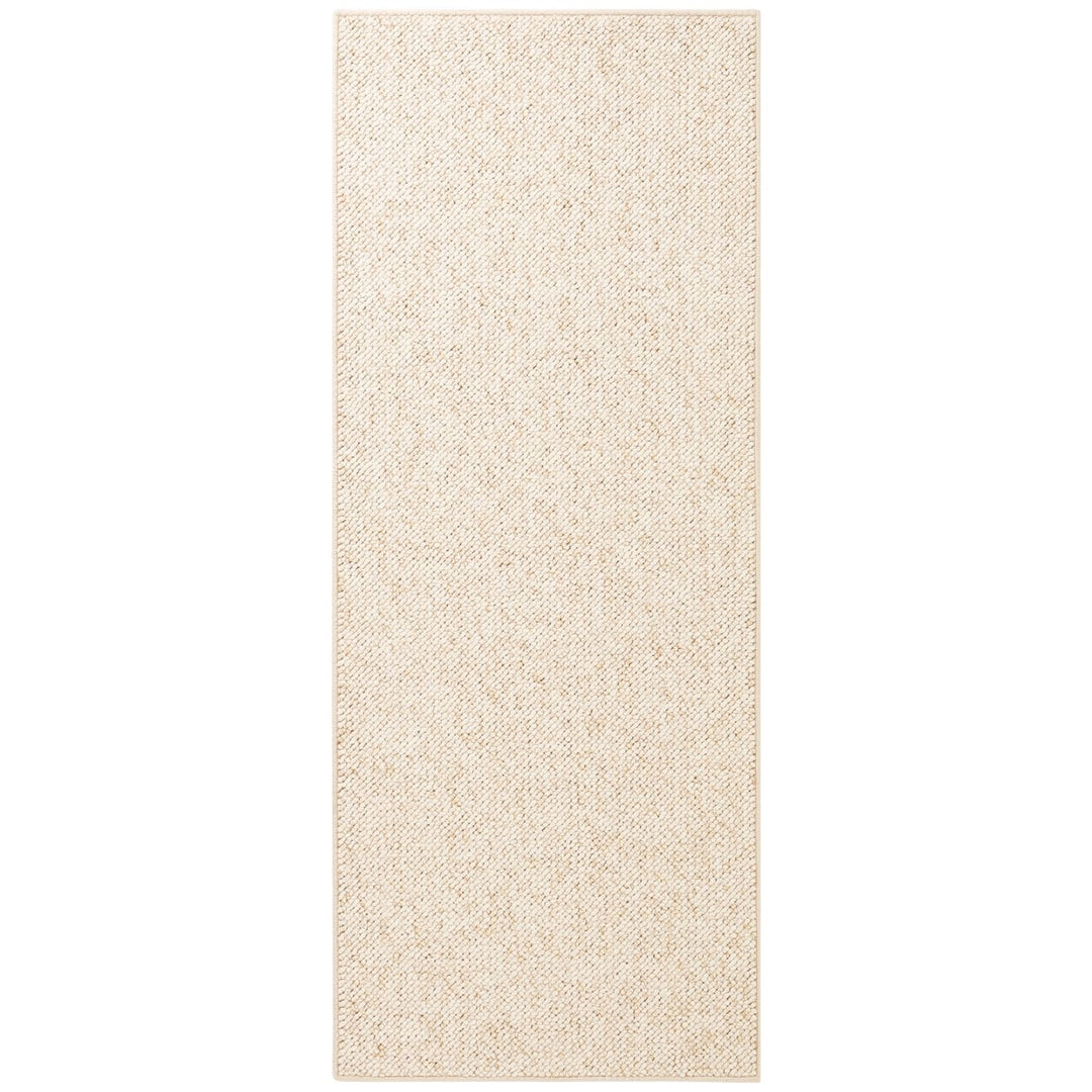 Beige woven rug on a white background