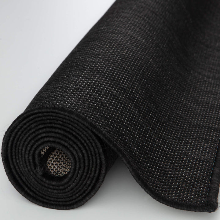rolled-outdoor-rug-black-plain